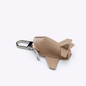 The Airplane Charm in Beige